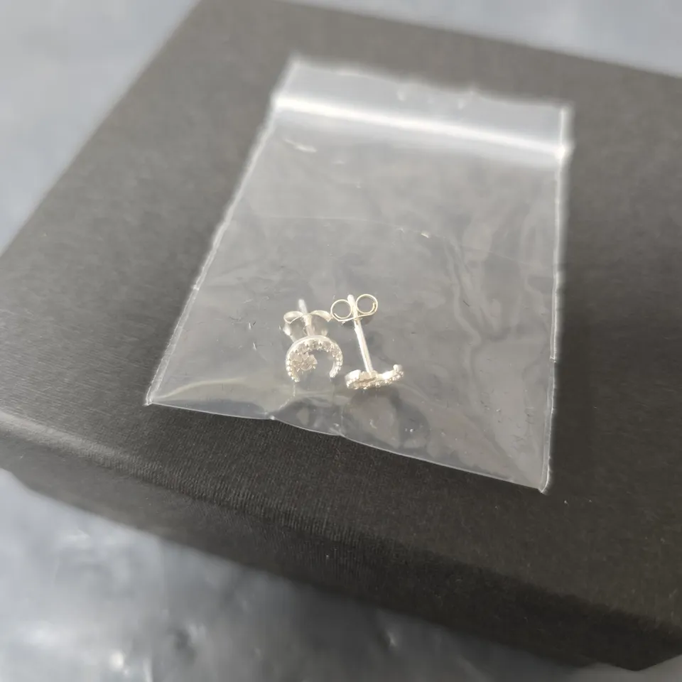 STERLING SILVER AND CUBIB ZIRCONIA MOON EARRINGS, ONE SIZE. IN BOX