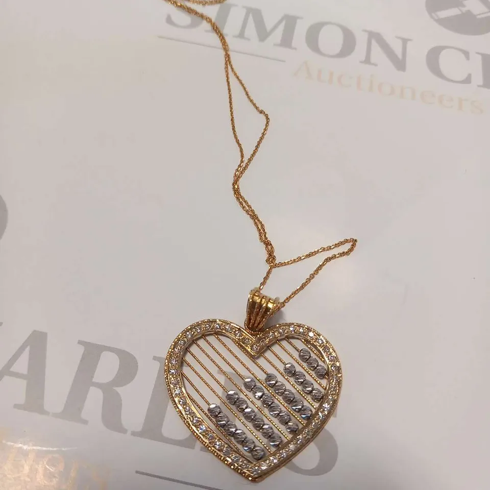 18CT GOLD HEART SHAPED PENDANT ON CHAIN, SET WITH NATURAL DIAMONDS