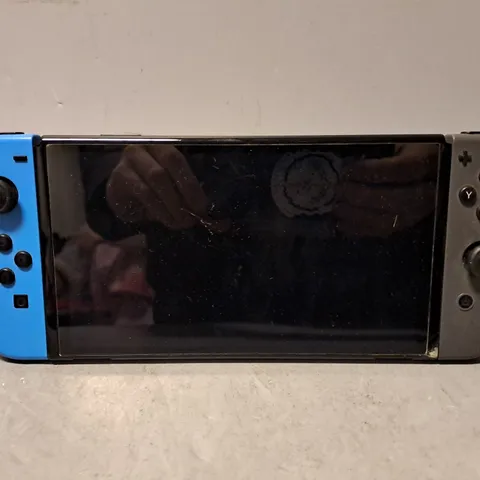 NINTENDO SWITCH OLED MODEL HEG-001 HANDHELD CONSOLE