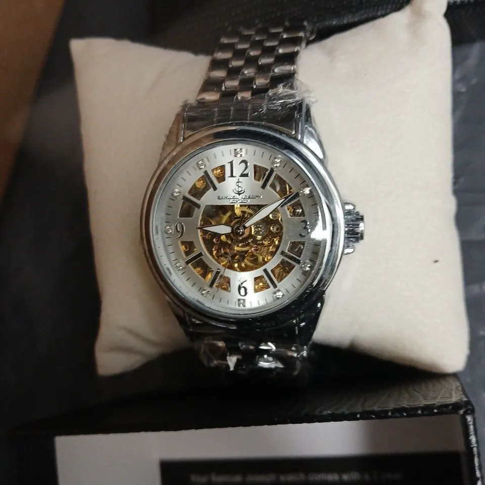 SAMUEL JOSEPH SKELETON DIAL STAINLESS STEEL BRACELET WRISTWATCH – BOXED