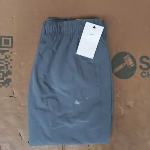 NIKE KID'S STANDARD FIT CHALLENGER PANTS IN GREY SIZE XL