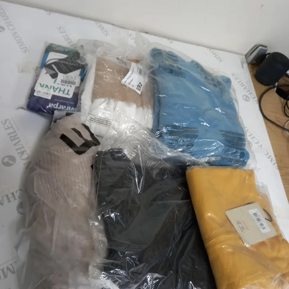 LARGE BOX OF ASSORTED CLOTHING ITEMS IN VARIOUS COLOURS AND SIZES INCLUDING TROUSERS , TOPS AND JUMPERS 