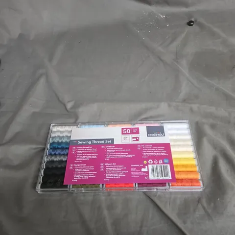 BOX OF APPROXIATELY 20 ASSORTED HOUSEHOLD ITEMS INCLUDING SEWING THREAD SET AND REPLACET DUST BAG FOR MINI ROBOT VACUUM 