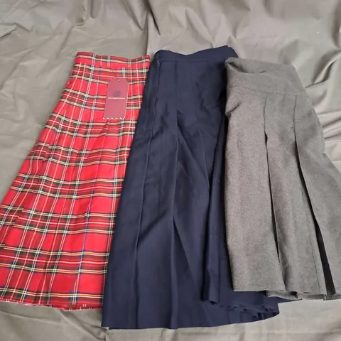 BOX OF APPROXIMATELY 40 SCHOOL SKIRTS IN ASSORTED COLOURS AND SIZES