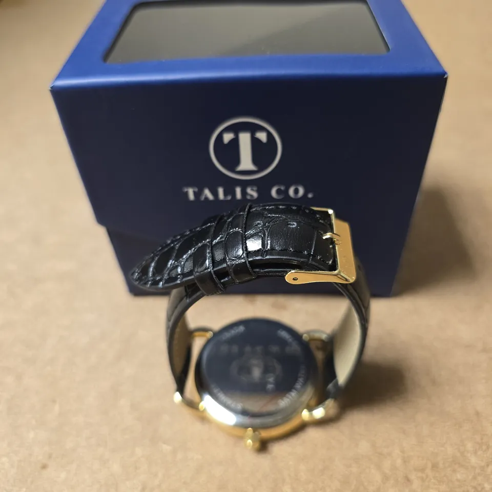 TALIS CO. GOLD-TONE WRISTWATCH WITH BLACK LEATHER STRAP – BOXED