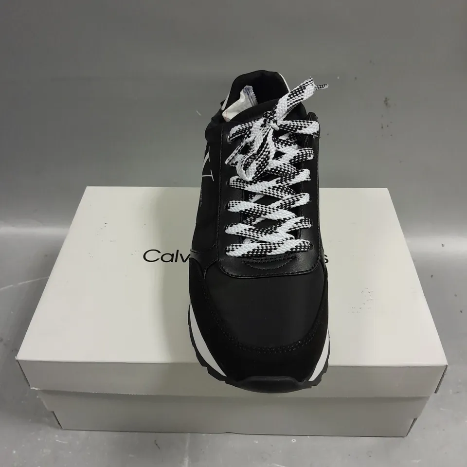 BOXED PAIR OF CALVIN KLEIN CAYLE BLACK FABRIC TRAINERS - 8