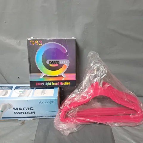 APPROXIMATELY 15 ASSORTED HOUSEHOLD ITEMS TO INCLUDE CLOTHES HANGERS, SMART LIGHT SOUND MACHINE AND A MAGIC BRUSH
