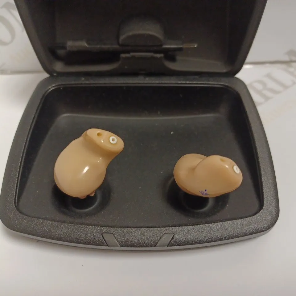 STARKEY HEARING AIDS WITH BOX