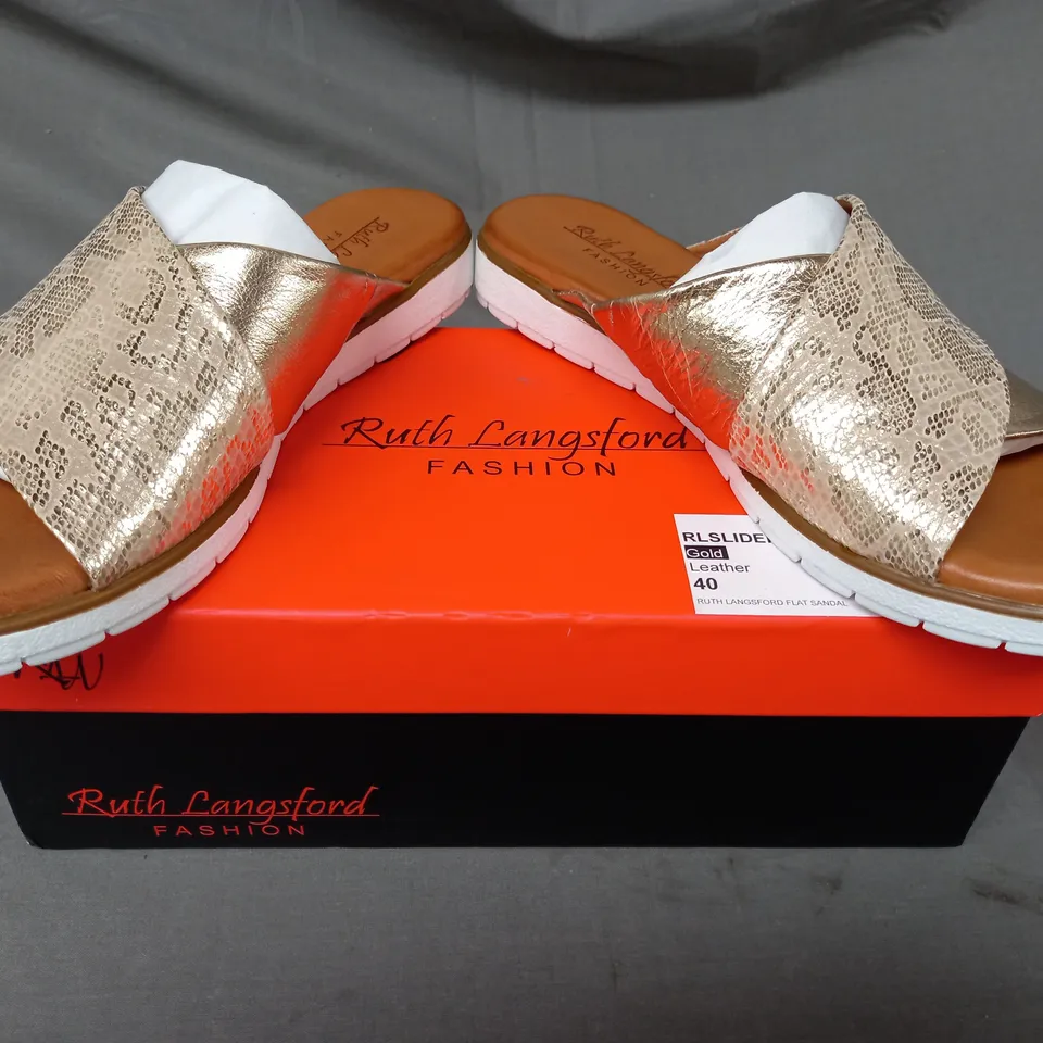 BOXED PAIR OF RUTH LANGSFORD FLAT SANDALS IN CHAMPAGNE GOLD SIZE 7