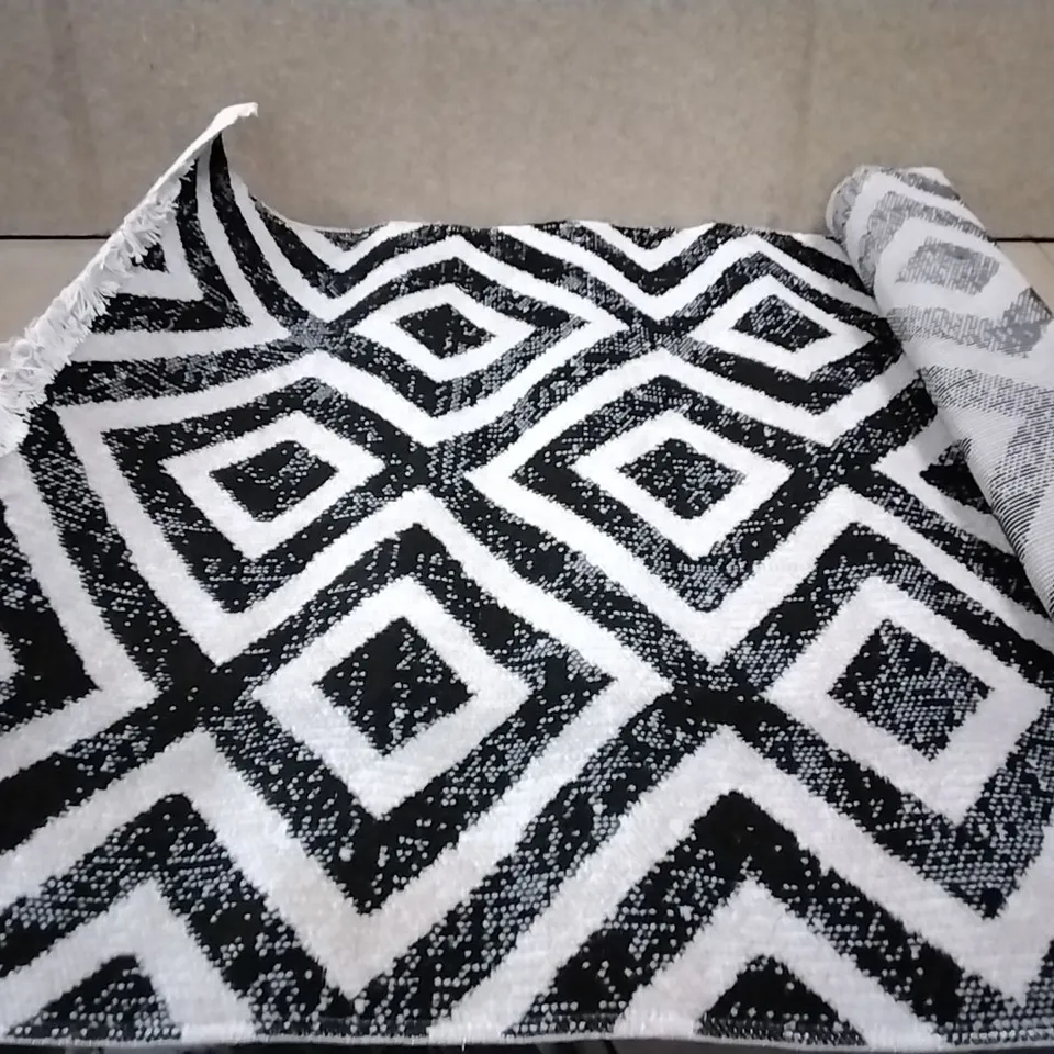 BRAND NEW PACO HOME BLACK-WHITE RUG SIZE 80CM X 150CM