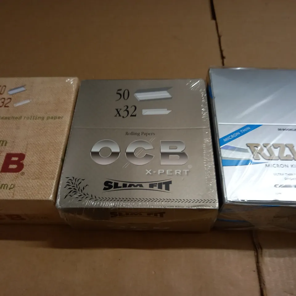 LOT OF 7 BOXES OF SMOKING ACCESSORIES TO INCLUDE RIZLAS AND FILTERS