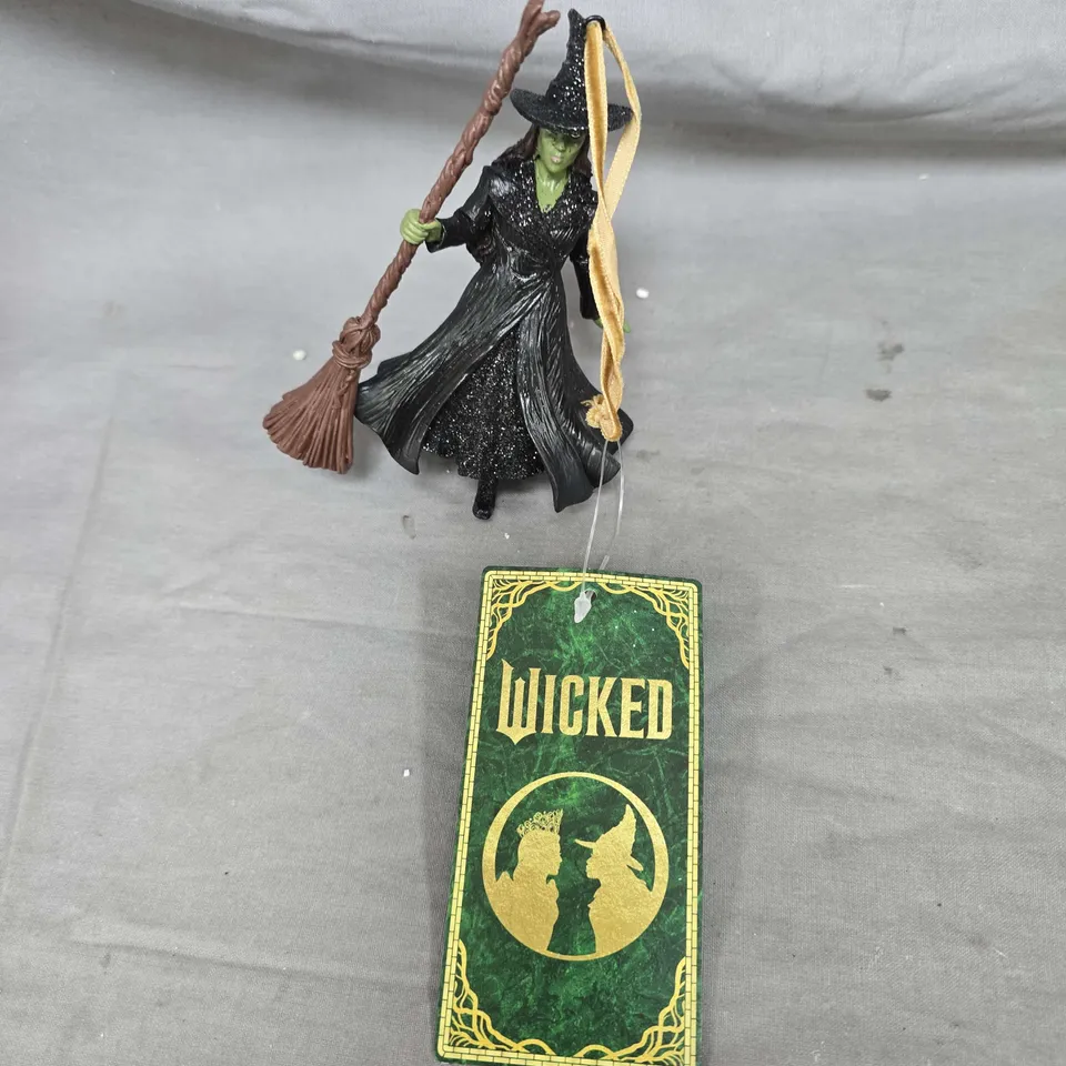 WITCH FIGURINE WITH BROOM, GREEN FACE – 'WICKED'