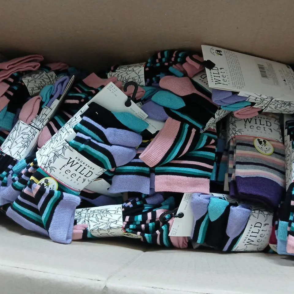 APPROXIMATELY 25 ASSORTED PACKS OF WILD FEET LADIES SOCKS IN VARIOUS COLOURS, STYLES AND SIZES