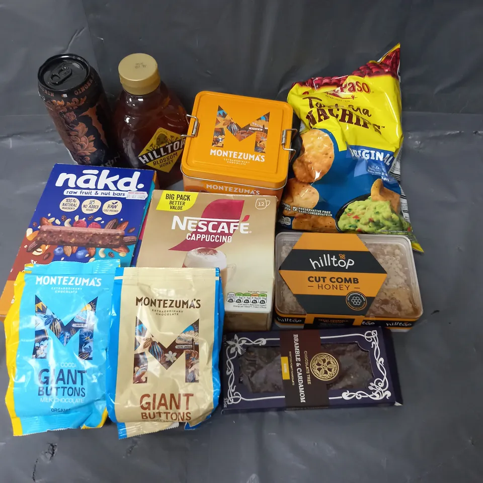 APPROXIMATELY 10 ASSORTED FOOD & DRINK ITEMS TO INCLUDE - HILLTOP CUT COMB HONEY - MONTEZUMA'S CHOCOLATE - NESCAFE CAPPUCINO - ETC 