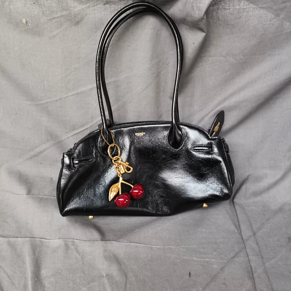 COACH NEW YORK - BLACK LEATHER HANDBAG WITH CHERRY CHARM