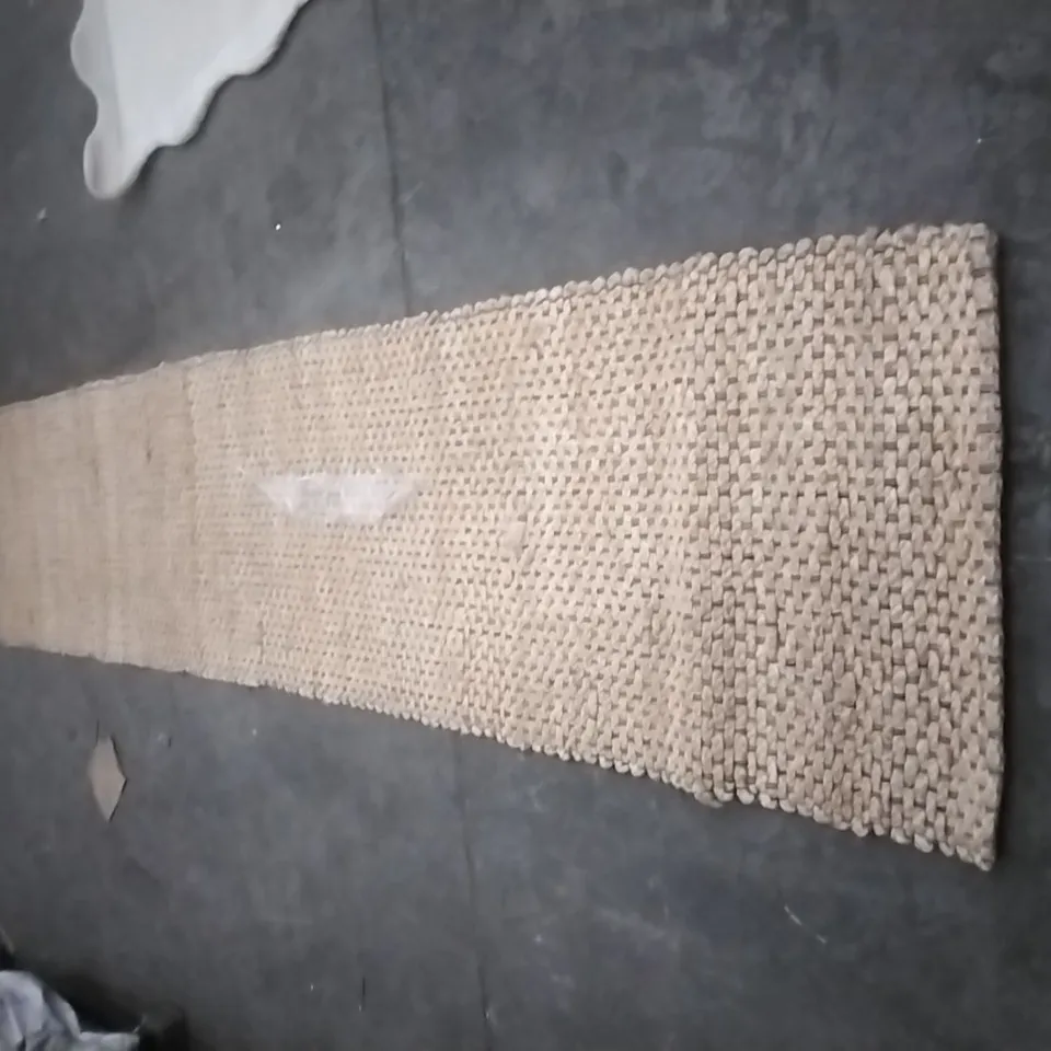STILLAGE OF APPROXIMATELY 40 ESIGNER RUGS