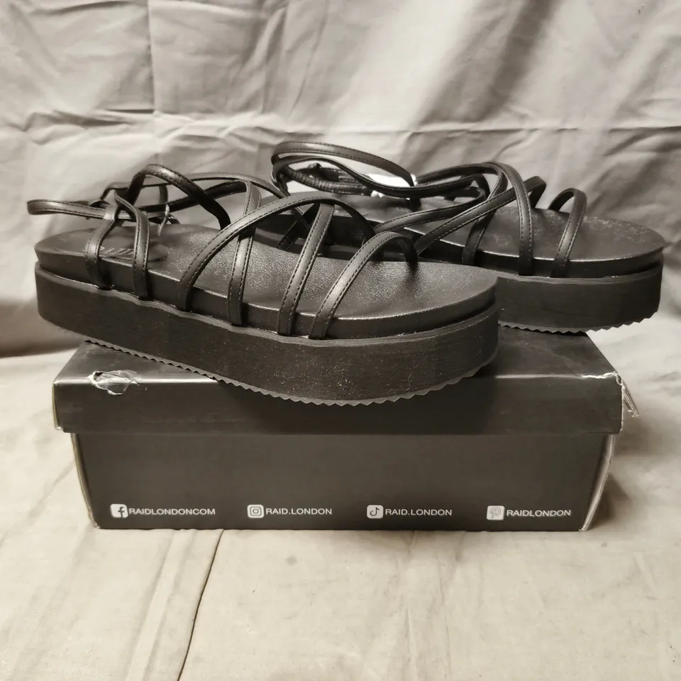 BOXED PAIR OF RAID LONDON PLATFORM STRAPPY SANDALS IN BLACK SIZE UK 9