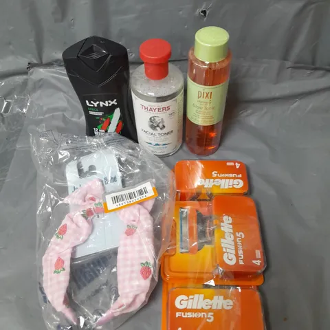 APPROXIMATELY 20 ASSORTED COSMETICS PRODUCTS TO INCLUDE - LYNX SHOWER GEL - GILLETTE FUSION 5 BLADES - PIXI FACE TONIC - ETC