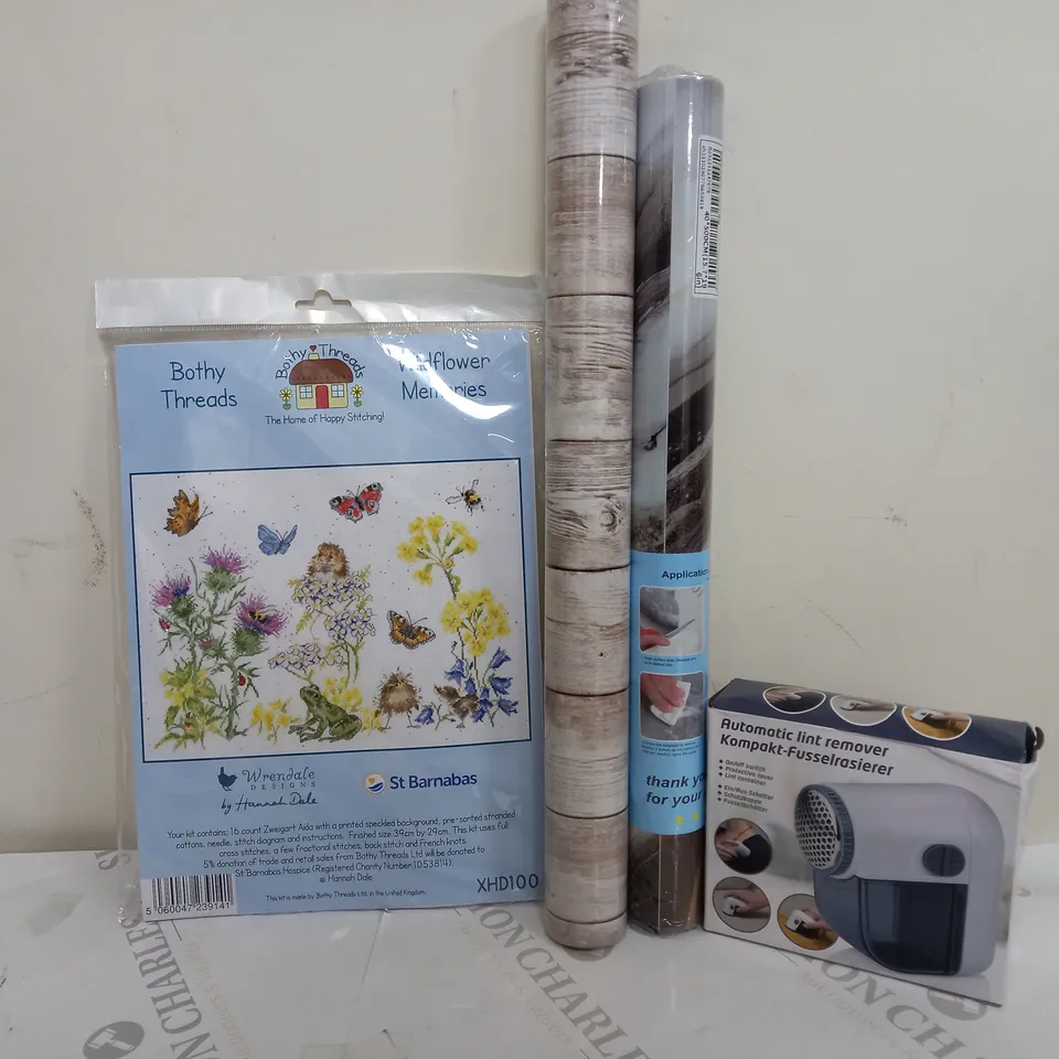 APPROXIMATELY 15 ASSORTED HOUSEHOLD ITEMS TO INCLUDE BOTHY BREADS WILDFLOWER MEMORIES, AUTOMATIC LINT REMOVER, WALLPAPER, ETC