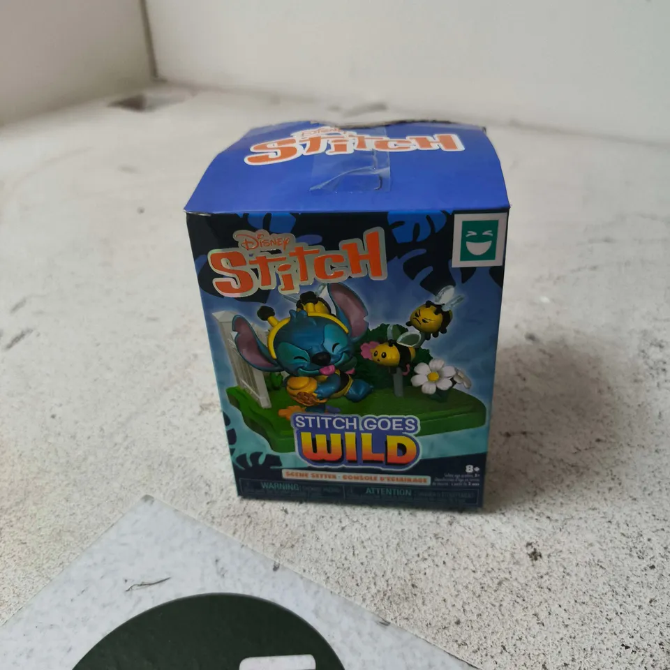 BOX OF APPROXIMATELY 12 ASSORTED TOYS INCLUDING DISNEY STITCH GOES WILD AND BUZZ LIGHT YEAR TOY FIGURE
