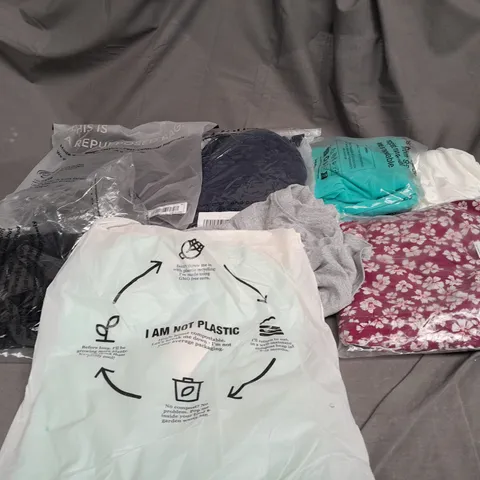 LARGE QAUNTIITY OF ASSORTED CLOTHES IN VARIOUS COLORS AND SIZES TO INCUDED DRESSES, T-SHIRTS , TROUSERS
