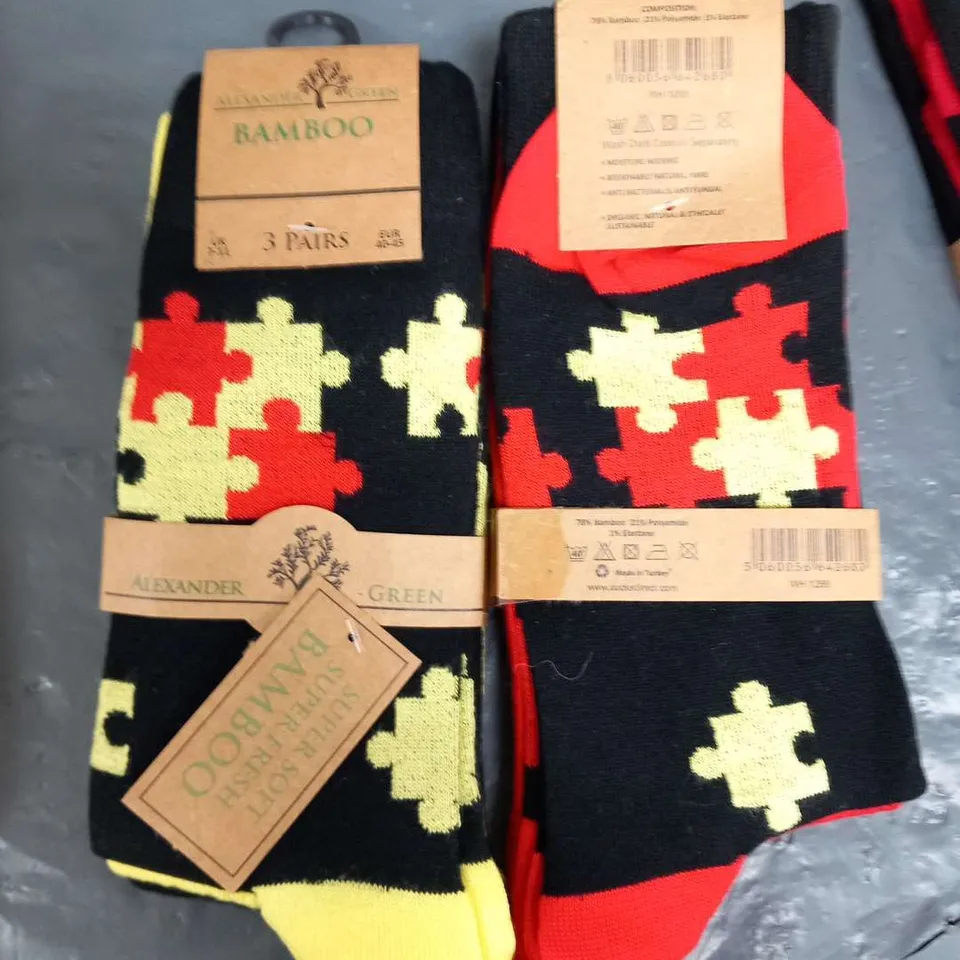 APPROXIMATELY 30 PACKS OF 6 PAIRS OF ALEXANDER GREEN BAMBOO SOCKS IN VARIOUS DESIGNS