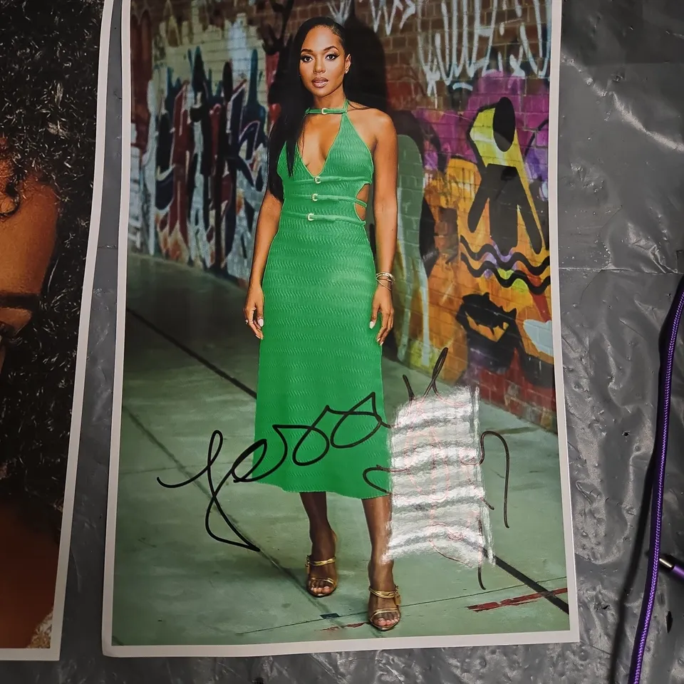 FOUR AUTOGRAPHED PHOTOGRAPHS OF JESSYE ROMEO 