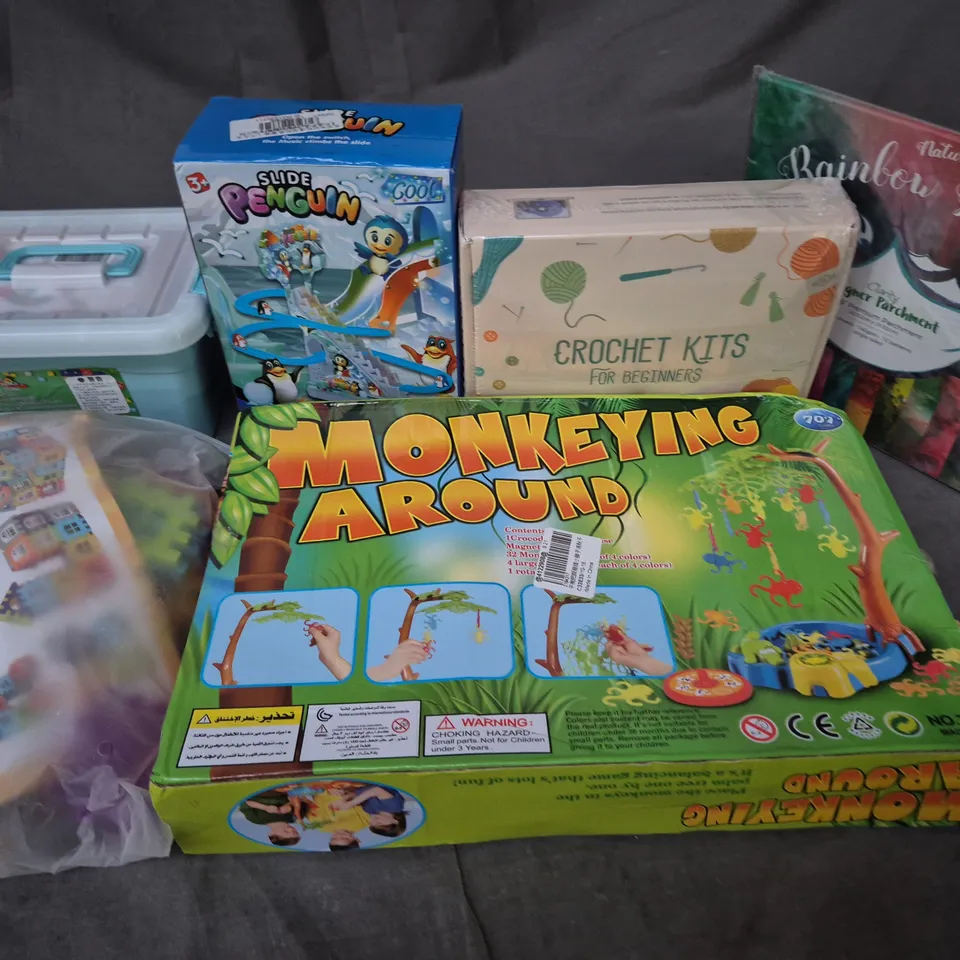 LOT OF 11 ASSORTED TOYS AND GAMES TO INCLUDE MONKEYING AROUND AND SLIDE PENGUIN