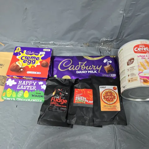 APPROXIMATELY 10 ASSORTED FOOD ITEMS TO INCLUDE CREME EGGS, CHILLI FUDGE, CADBURYS ETC. 