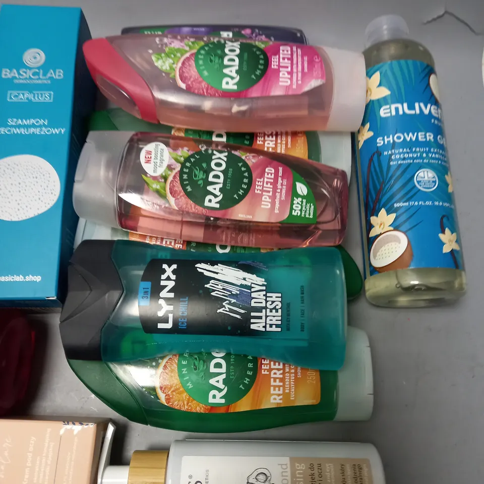 lot of approximately 18 assorted health and beauty items to include sonic electric toothbrush, apis almond oil and various shower gels