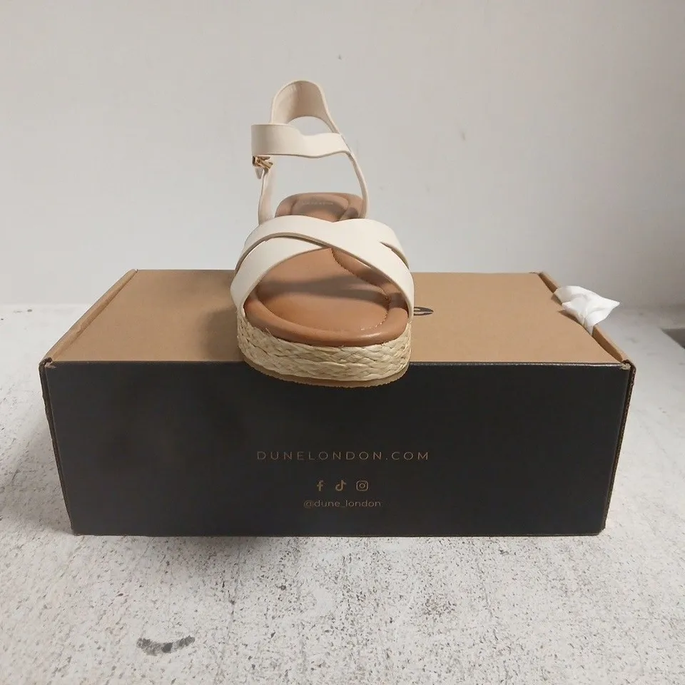BOXED PAIR OF DUNE LONDON CROSS STRAP LOW WEDGE SANDALS IN CREAM SIZE 5