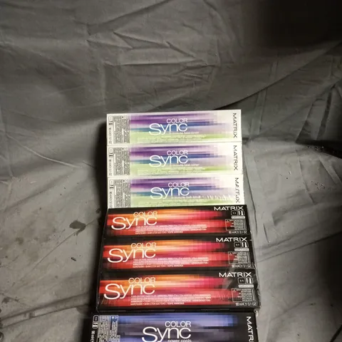 BOX OF APPROXIMATELY 60 ASSORTED MATRIX HAIR CARE PRODUCTS INCLUDING COLOR SYNC 5 MINUTE FAST TONER, COLOR SYNC VIOLET/LIGHT BROWN ASH/LIGHT BROWN MOCHA VIOLET/MEDIUM BROWN RED VIOLET AND SO COLOR DAR