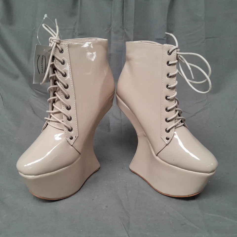 BOX OF APPROXIMATELY 10 BOXED PAIRS OF CASANDRA HIGH PLATFORM SHOES IN NUDE - VARIOUS SIZES