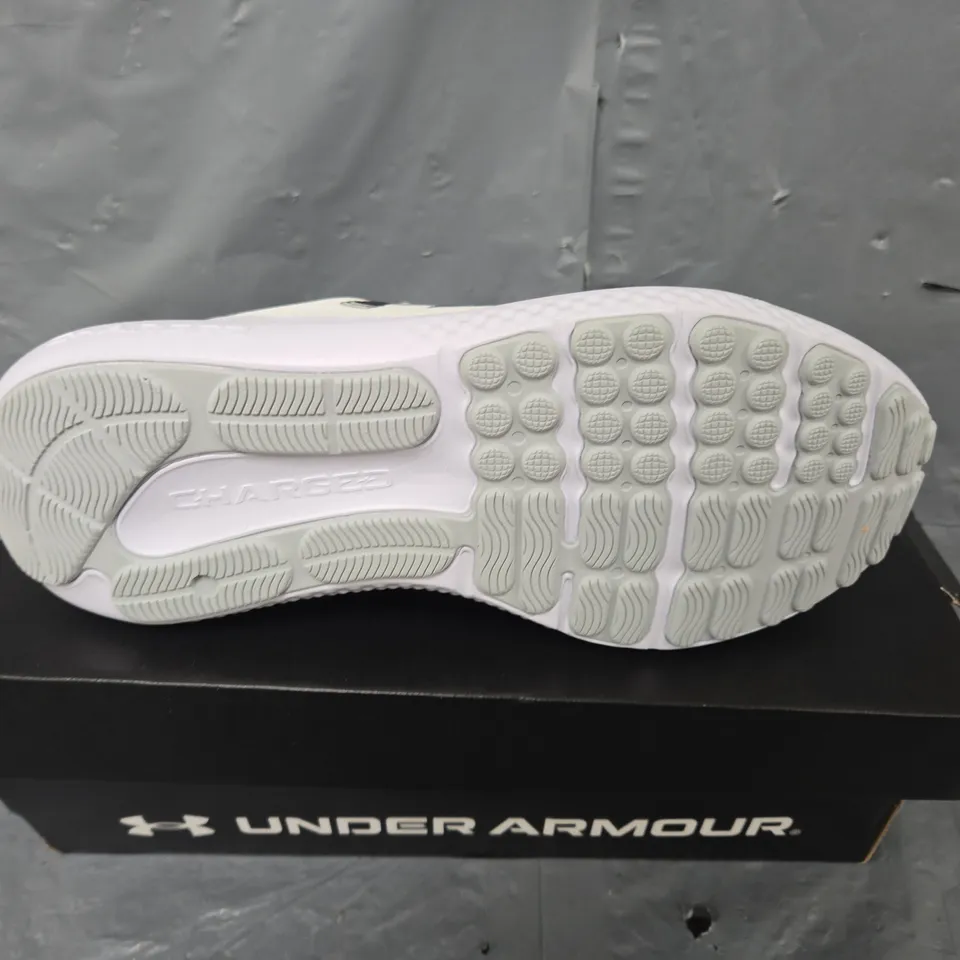 BOXED PAIR OF UNDER ARMOUR CHARGED SURGE 4 TRAINERS IN WHITE - UK 10