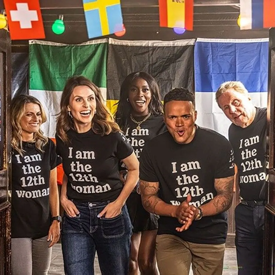 PALLET TO CONTAIN A LARGE AMOUNT OF "I AM THE 12TH WOMAN" BLACK T SHIRTS UEFA FOOTBALL