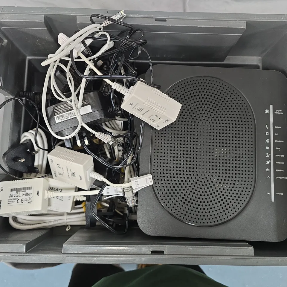 BOX OF ASSORTED ITEMS TO INCLUDE - CABLES - PLUGS AND MODEMS 