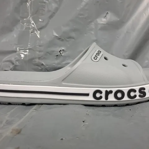 PAIR OF CROCS BAYABAND SLIDES IN GREY SIZE UK M8/W9