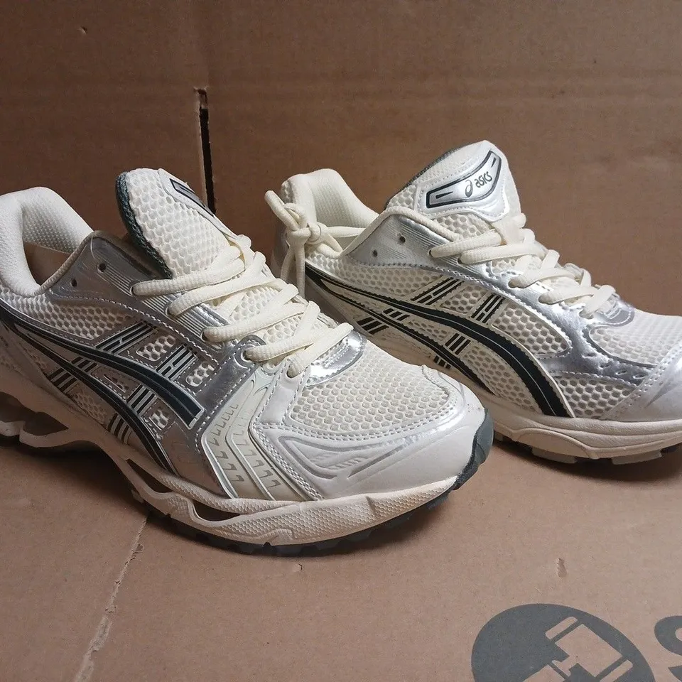 PAIR OF ASICS TRAINERS IN CREAM/SILVER/DEEP FOREST SIZE UK 8.5