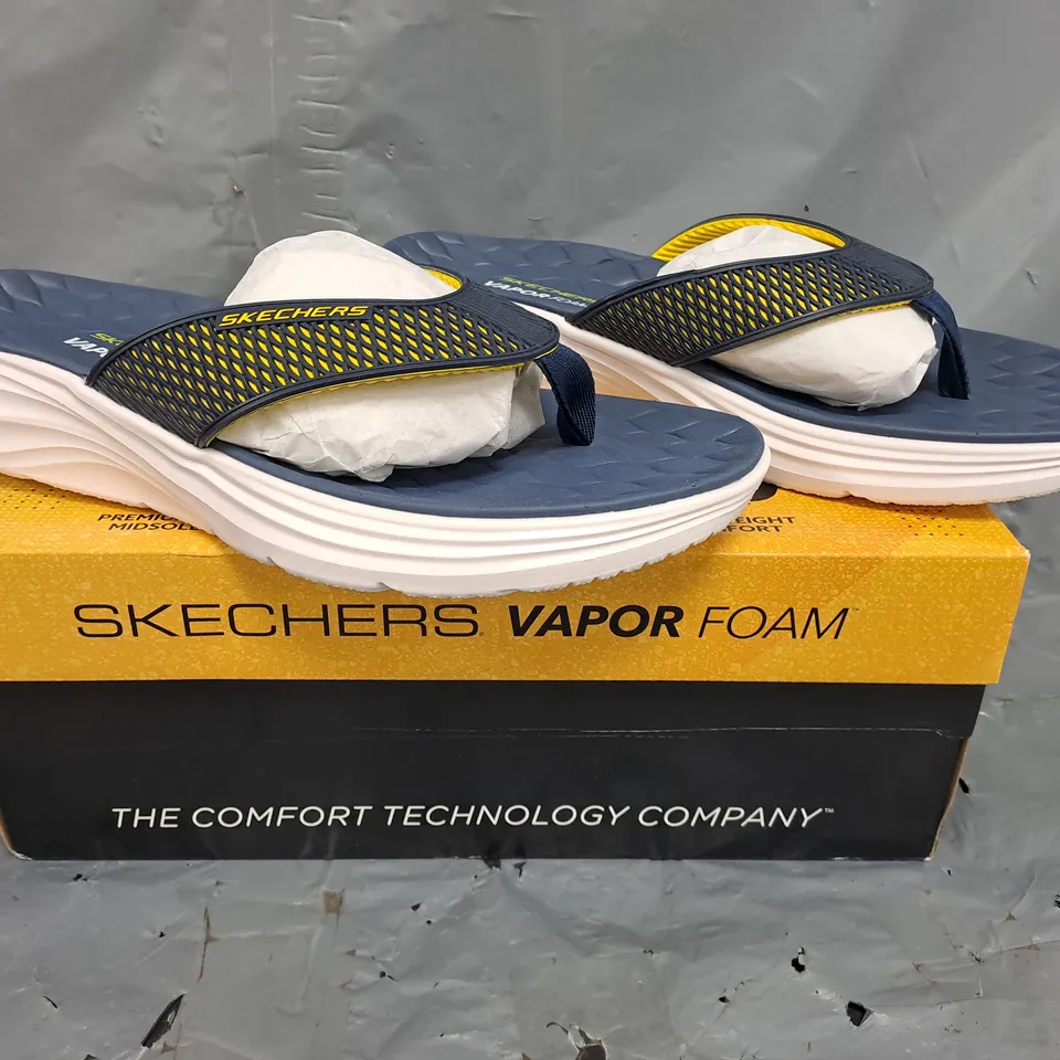 BOXED PAIR OF SKECHERS TOE-POST SANDALS IN NAVY/YELLOW SIZE UK 11
