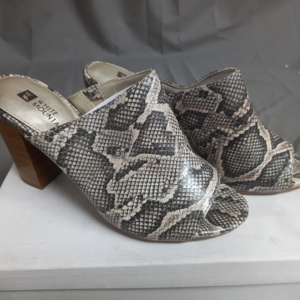 BOX OF APPROXIMATELY 15 PAIRS WHITE MOUNTAIN HELLS IN VARIOUS COLOR AND SIZES 