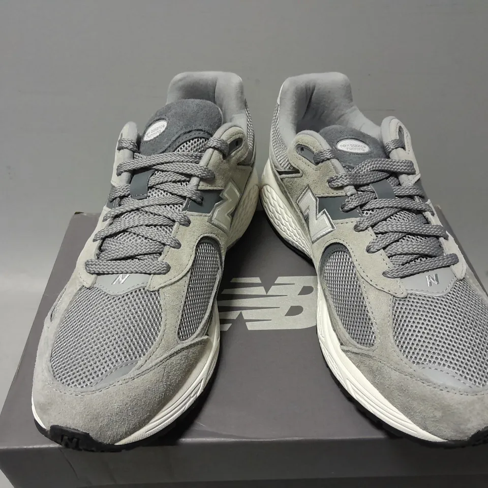 BOXED PAIR OF NEW BALANCE 2002R IN GREY - UK 11