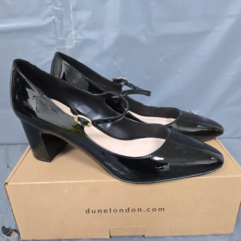 BOXED PAIR OF DUNE BLACK PATENT SYNTHETIC MARY JANE HEELS - SIZE 41