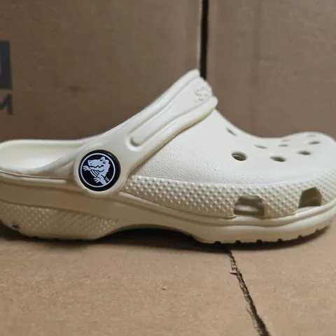PAIR OF CROCS CLASSIC KID'S CLOGS IN BEIGE SIZE UK C11