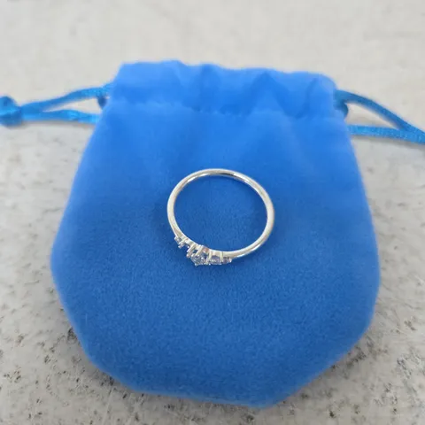 SILVER-TONE RING WITH ROW OF SMALL STONES