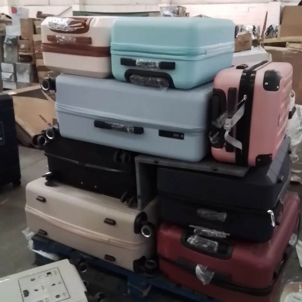 PALLET OF SUITCASES