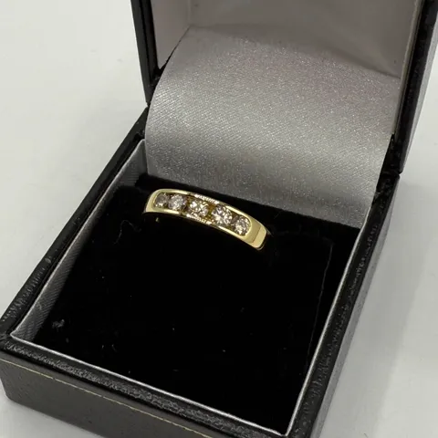 18CT YELLOW GOLD FIVE STONE HALF ETERNITY RING CHANNEL SET WITH NATURAL DIAMONDS