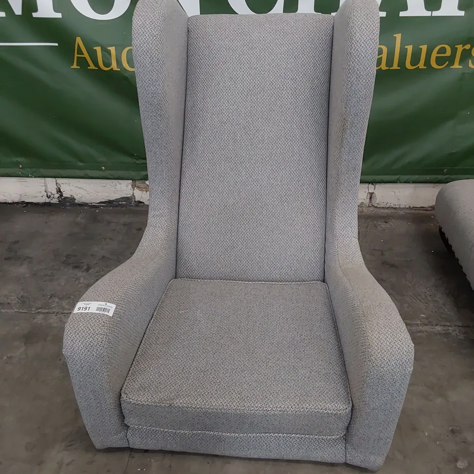 DESIGNER HIGH BACKED WINGED EASY CHAIR GREY FABRIC WITH STUDDED DETAIL 