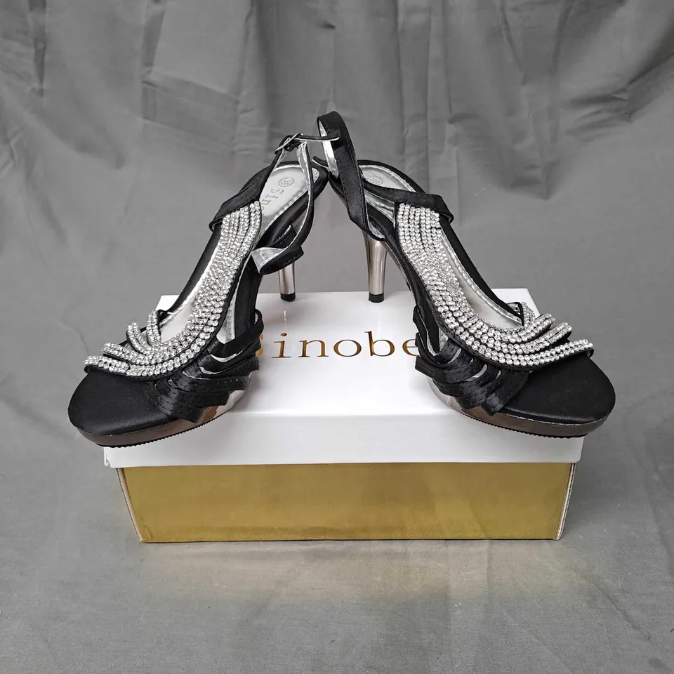 BOX OF APPROXIMATELY 10 PAIRS OF EMBELLISHED STRAPPY HEELS IN BLACK - VARIOUS SIZES
