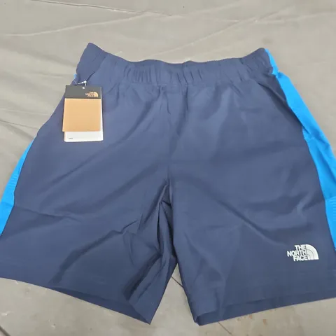 THE NORTH FACE 247 SHORTS IN BLUE - MEDIUM