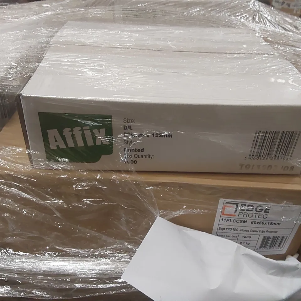 PALLET CONTAINING A LARGE QUANTITY OF PACKAGING ITEMS INCLUDING: SELF ADHESIVE PAPER TAPE, PAPER ENVELOPES, CLOSED CORNER EDGE PROTECTOR ECT